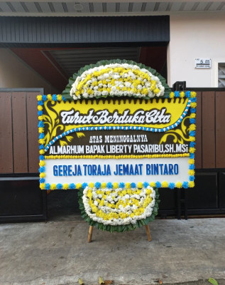 Papan Bunga Duka di Batang Kapas